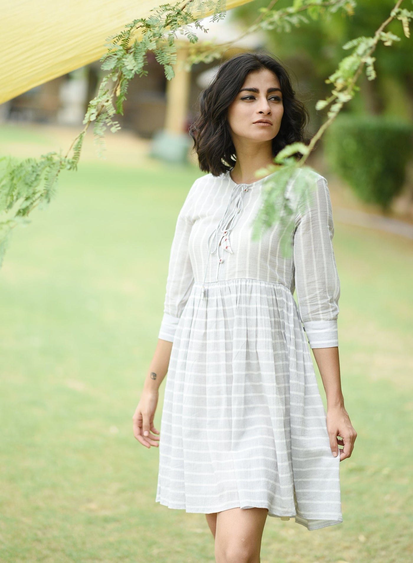 Buy Grey Coloured Tassle Dress